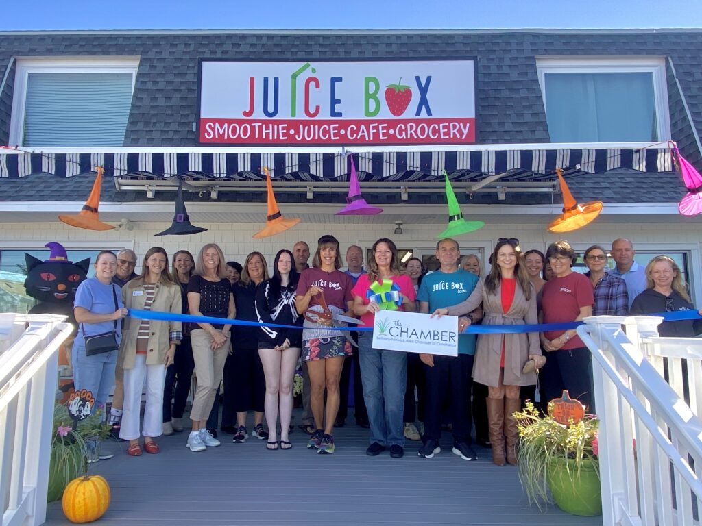 a group of people standing in front of a building