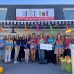 a group of people standing in front of a building