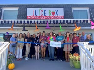 a group of people standing in front of a building