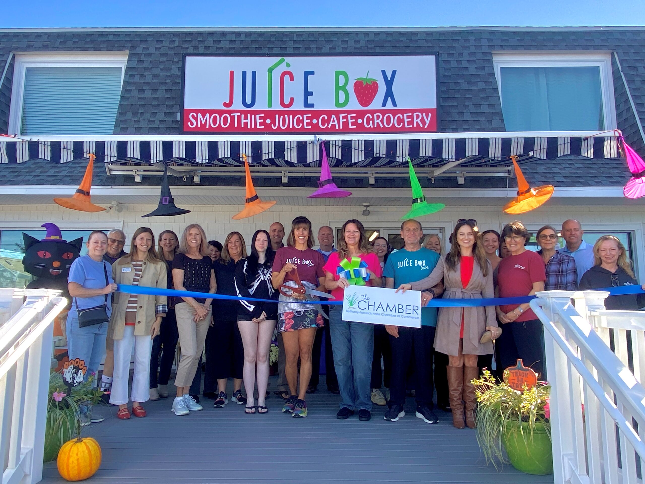 a group of people standing in front of a building
