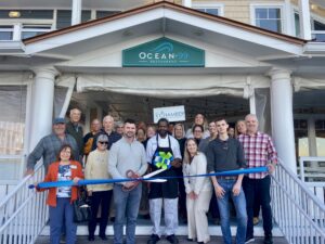 a group of people standing in front of a building