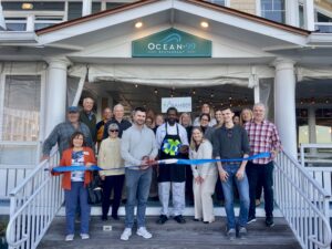 a group of people standing in front of a building