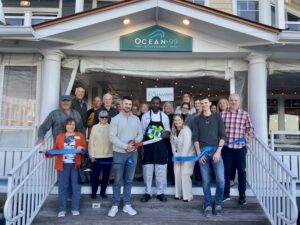 a group of people standing outside of a building