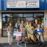 a group of people standing in front of a building