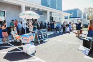 a group of people standing outside of a building