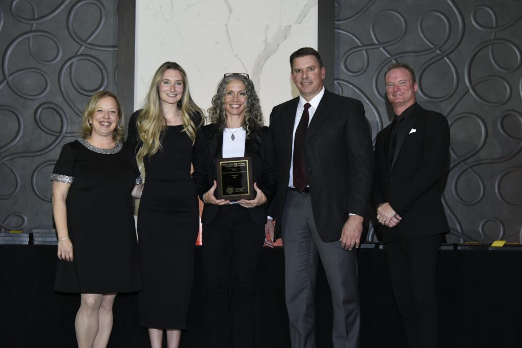 a group of people standing next to each other