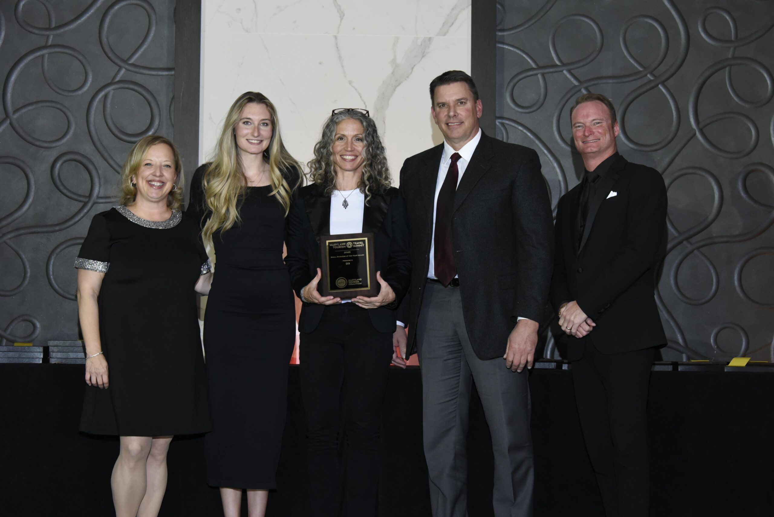 a group of people standing next to each other