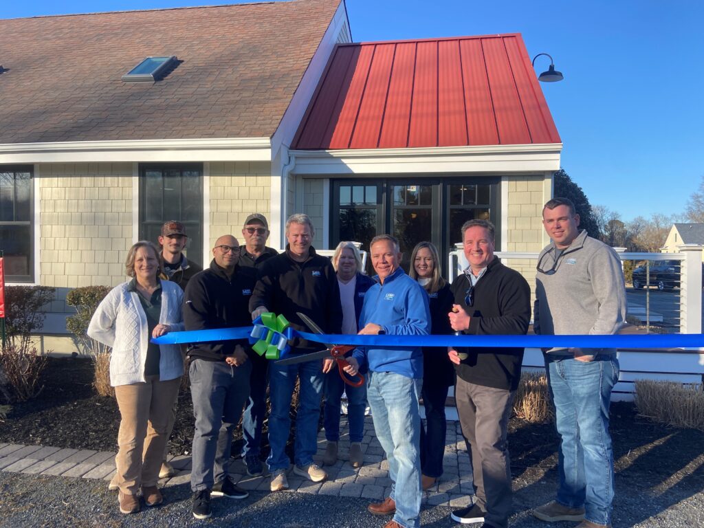 a group of people standing in front of a building