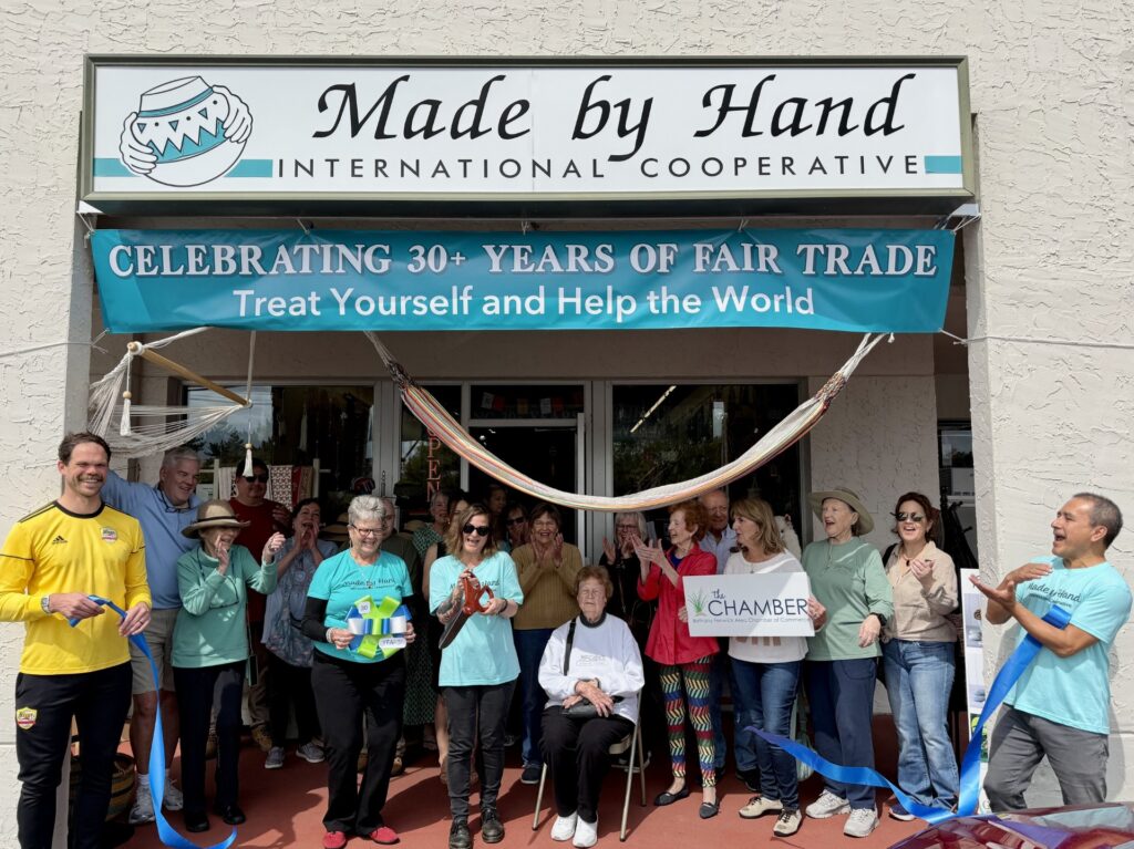 a group of people standing in front of a building