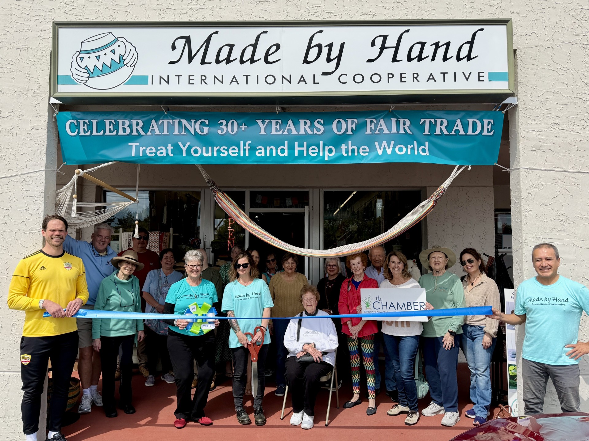 a group of people standing in front of a building