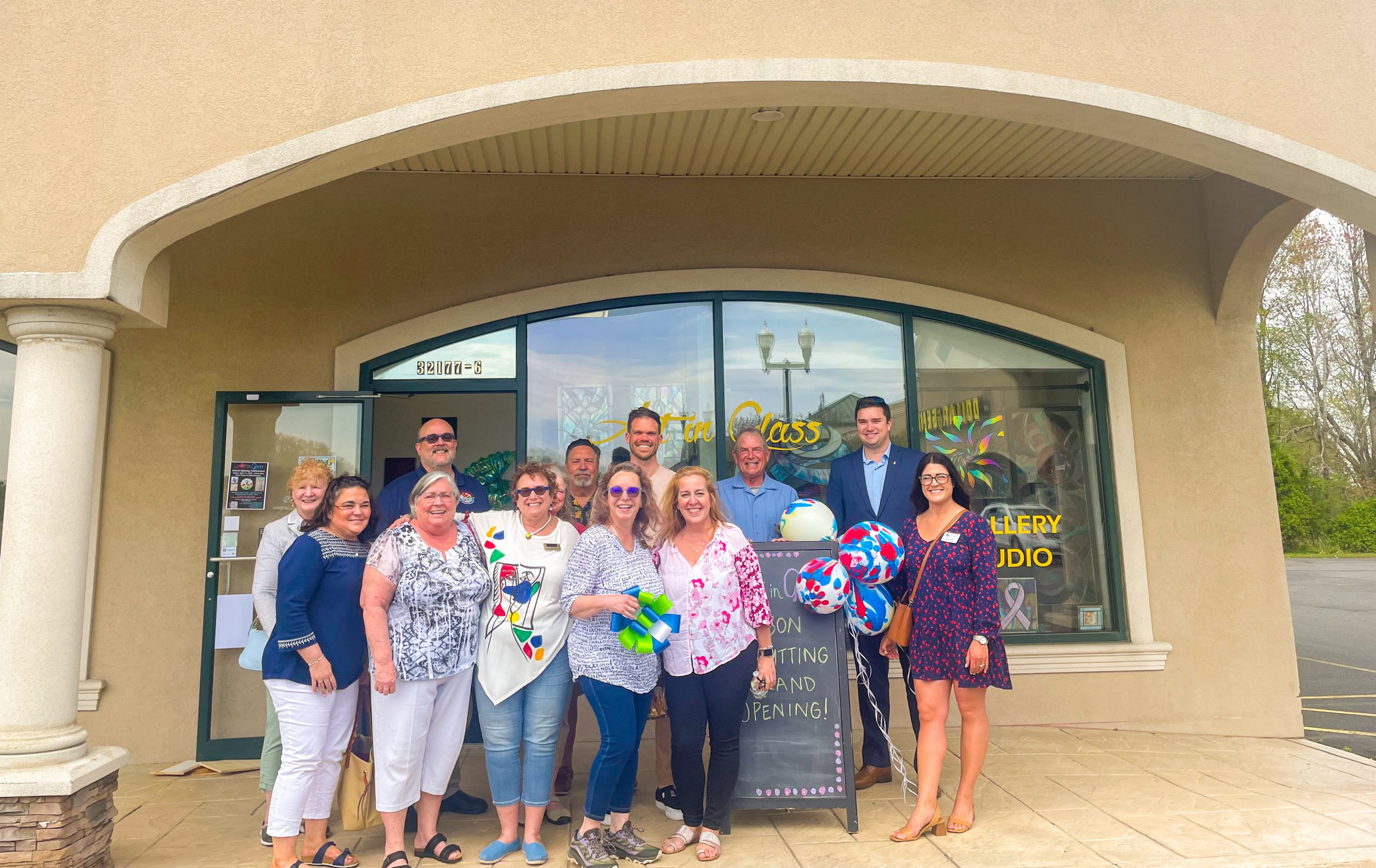 a group of people standing in front of a building