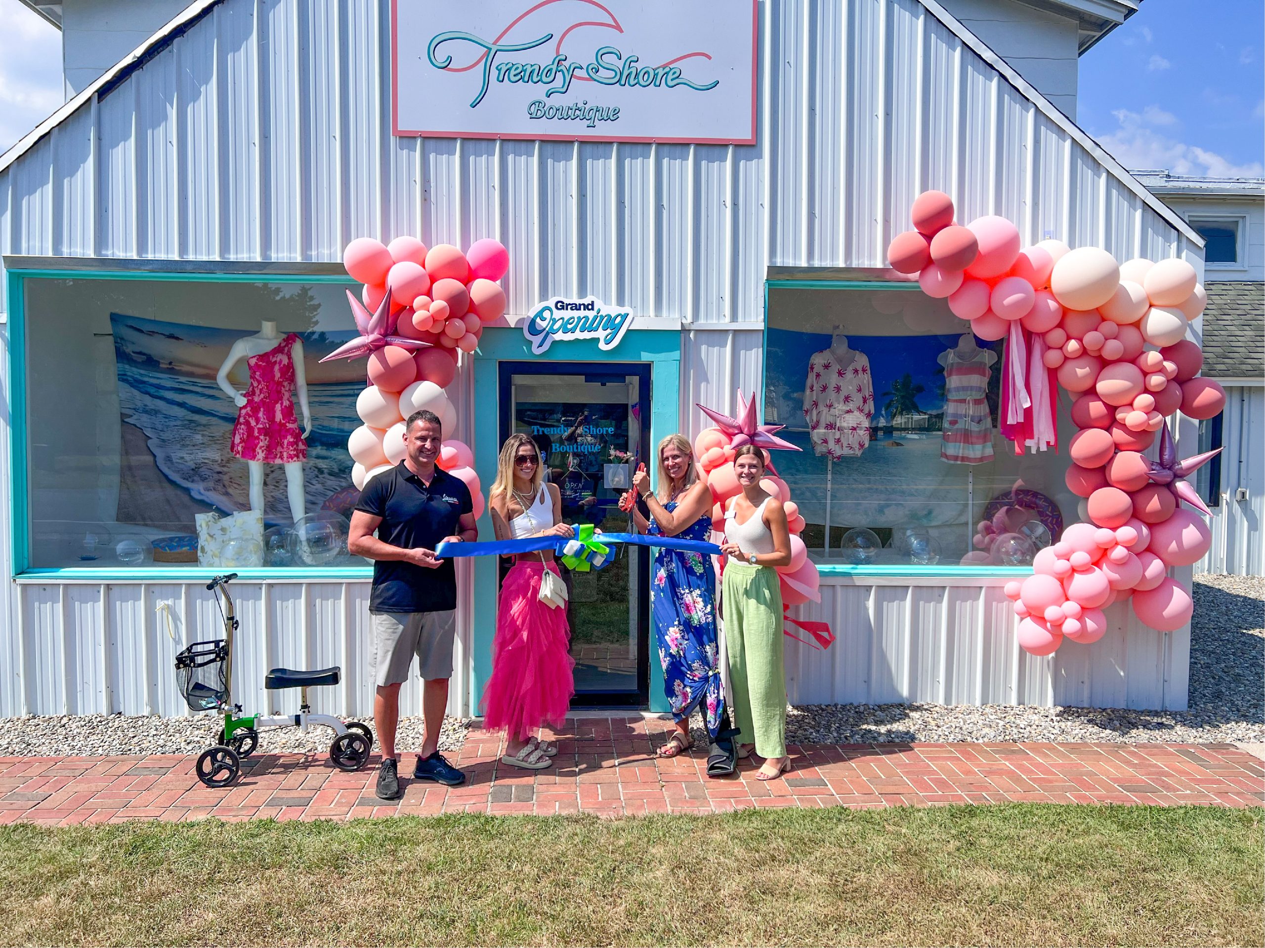 a group of people standing in front of a store