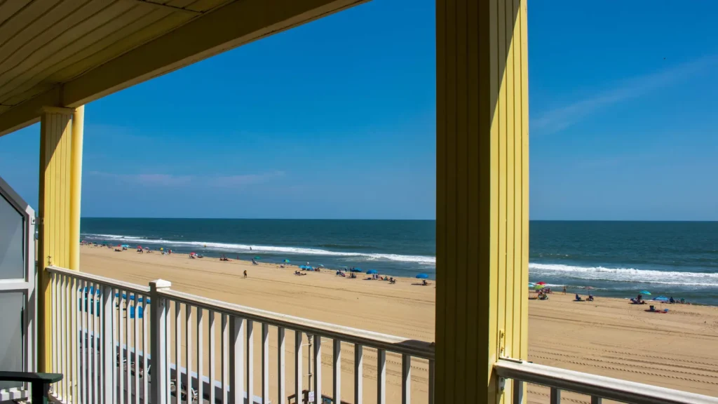 a balcony with a view of the beach