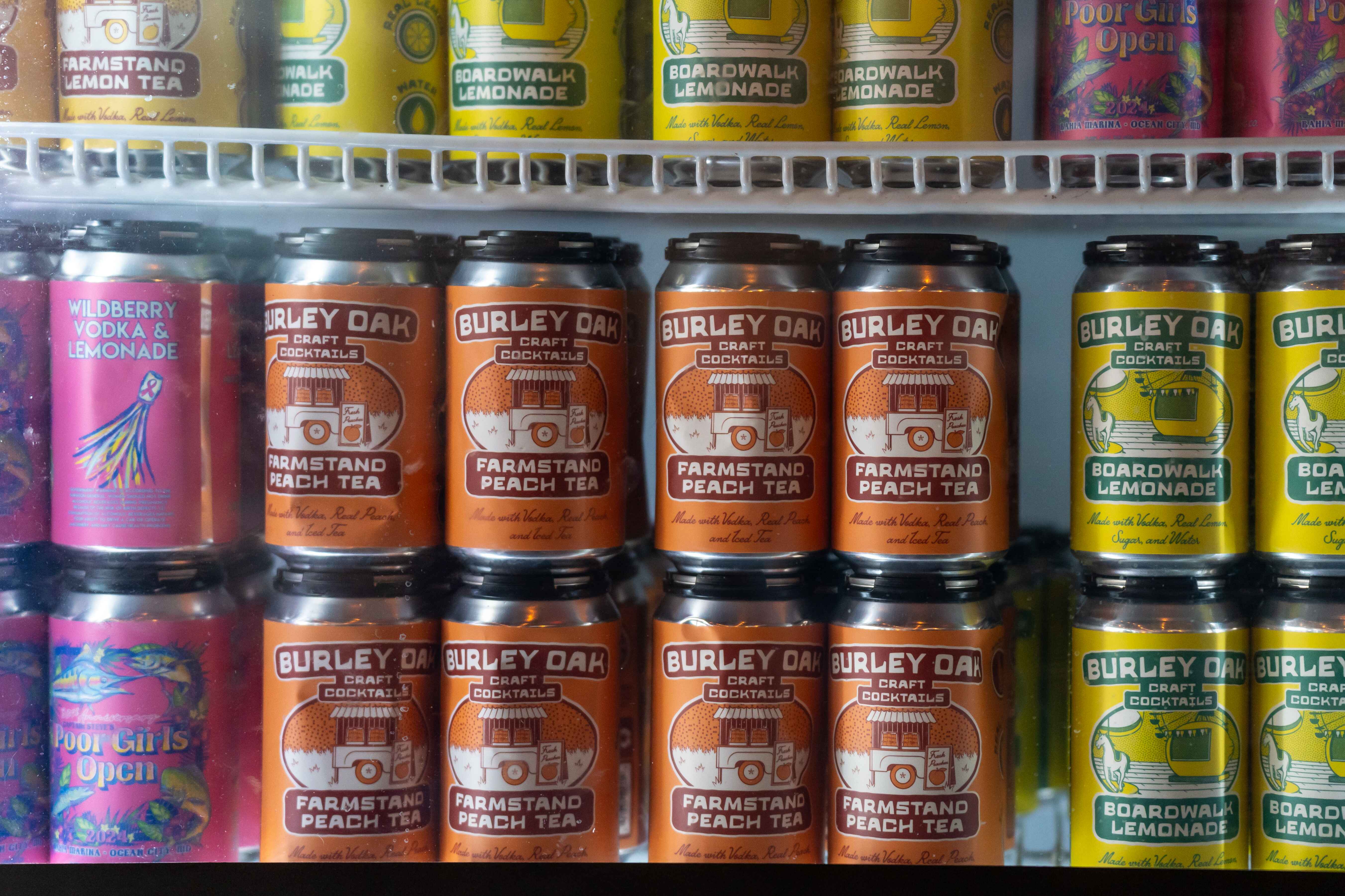 a refrigerator filled with lots of different types of drinks