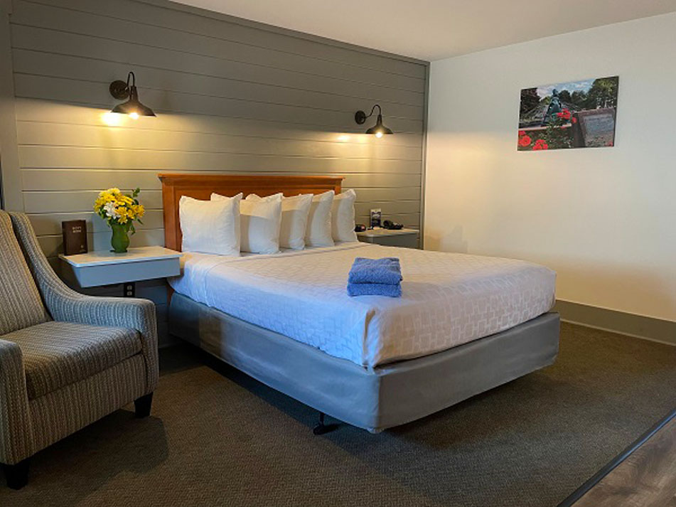 Bed made with white bed sheets