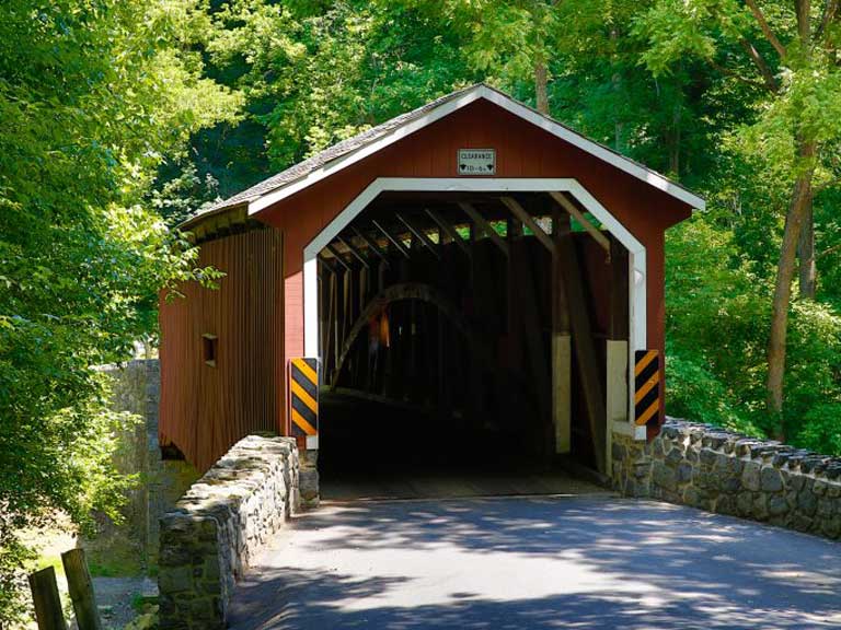Bridge with a red wooden covering