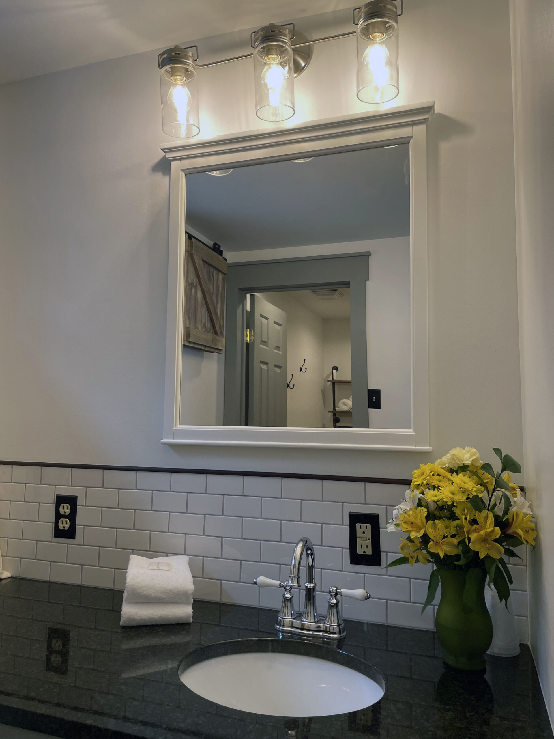Bathroom sink with yellow flowers