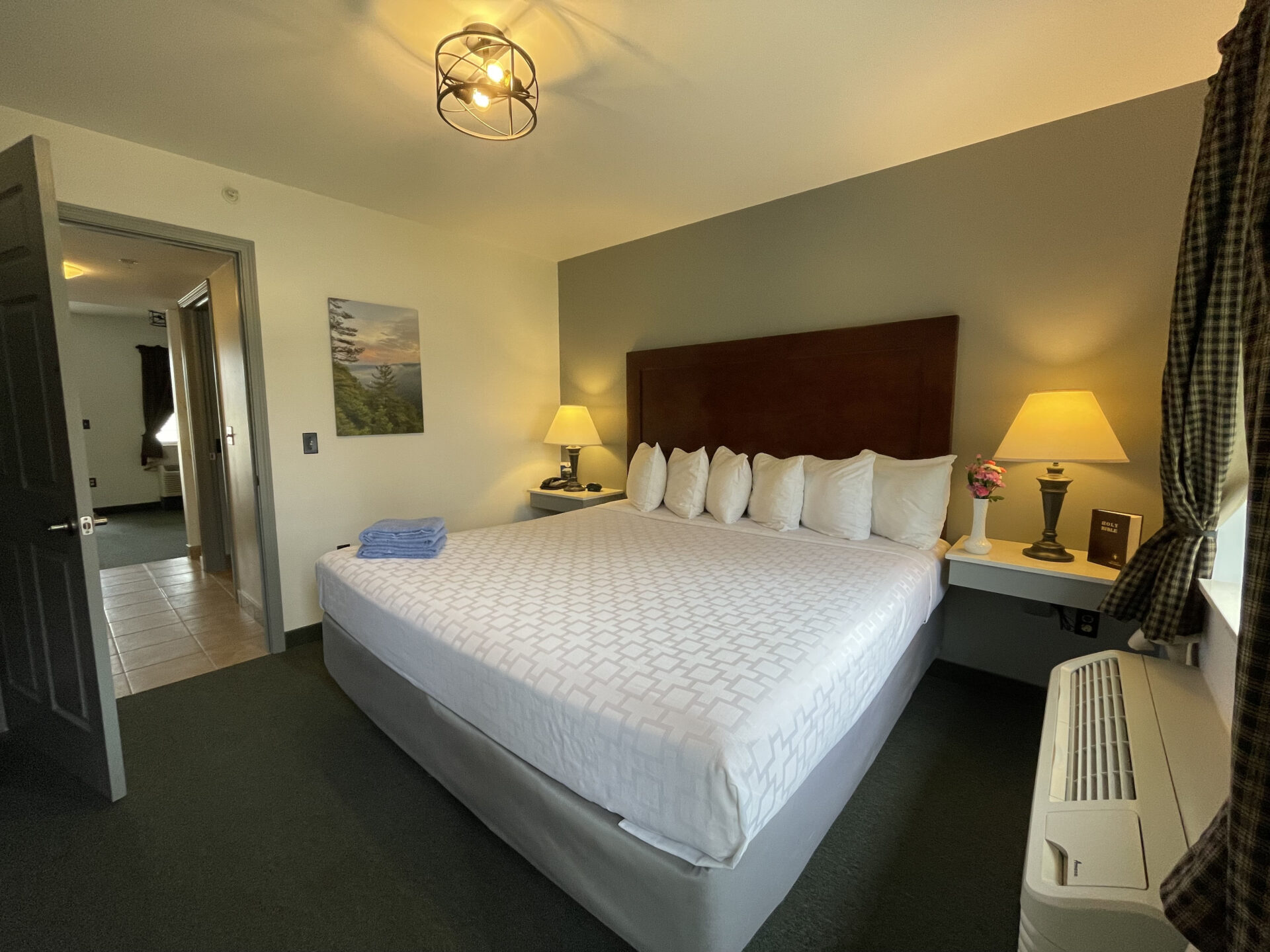 Bed made with white bed sheets