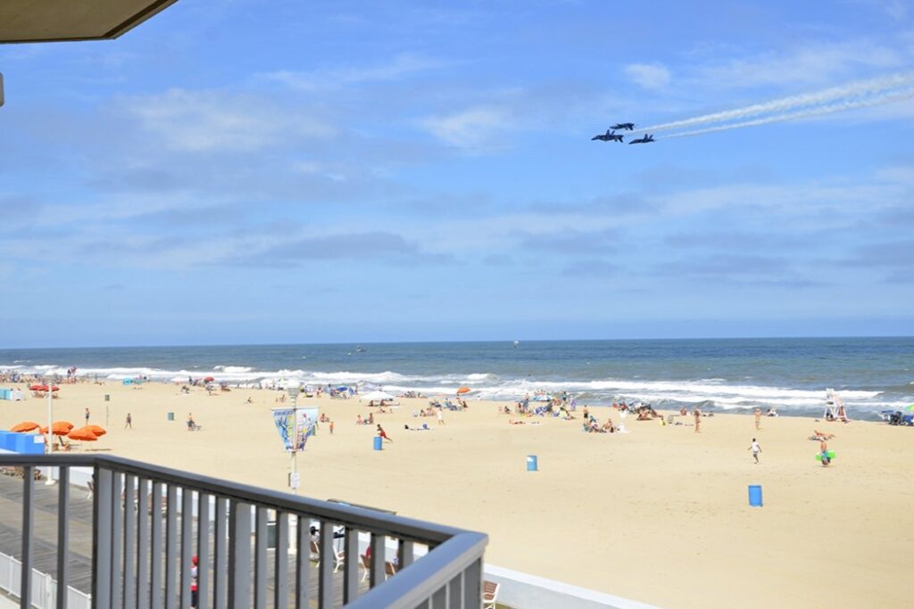 a view of the beach from an apartment balcony