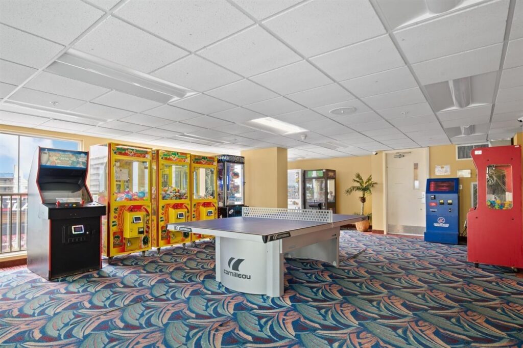 a room with arcade machines and games in it