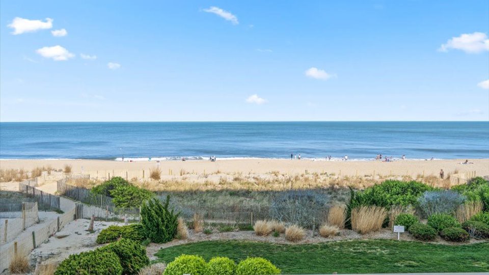 a view of the beach from an apartment balcony