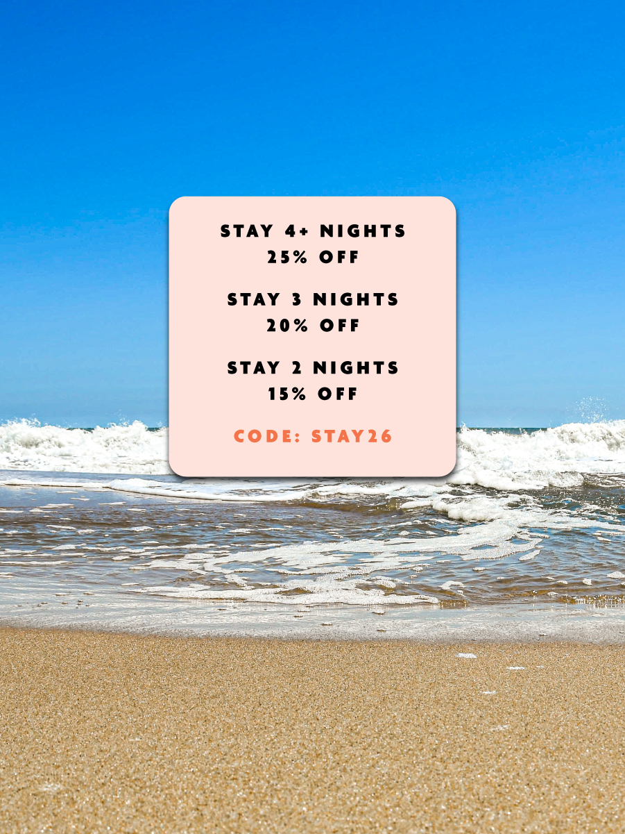 a beach with a sign that says stay 4 nights stay 3 nights stay 3 nights