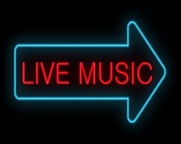 Lit up sign that says "Live music".