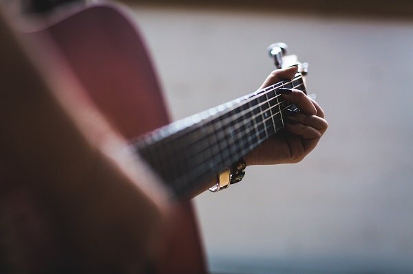 Strings from an Acoustic guitar.