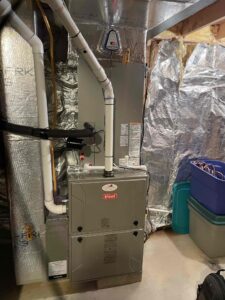 a furnace and a water heater in a room