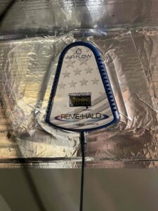 a clock that is on top of a piece of tin foil