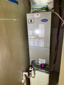 a water heater in the corner of a room