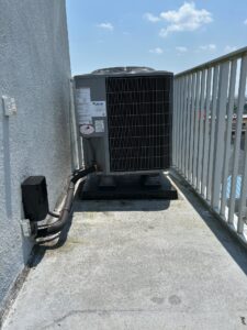 an air conditioner on the side of a building