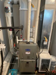 a furnace and a water heater in a room