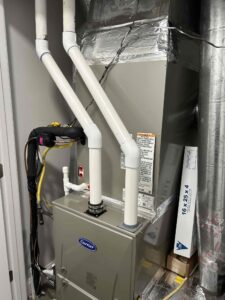 a furnace and a water heater in a room