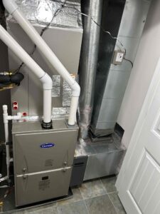 a furnace and a water heater in a room
