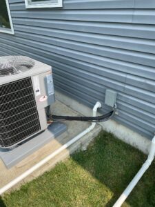 an air conditioner outside of a house