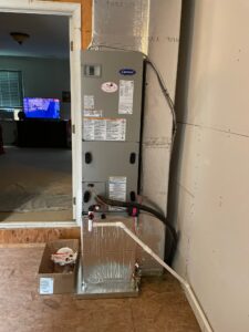 a room with a heater and a door