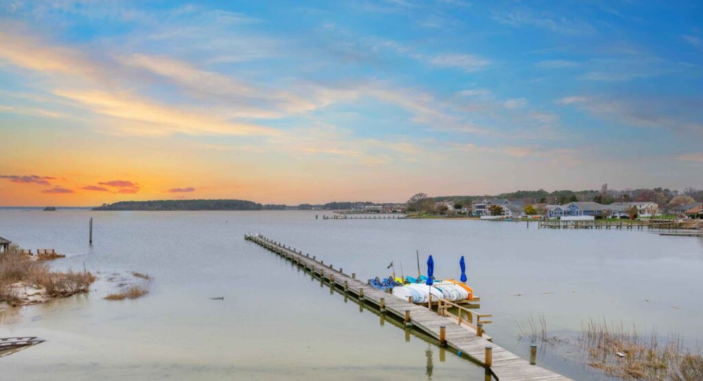 a dock that is sitting in the middle of a body of water