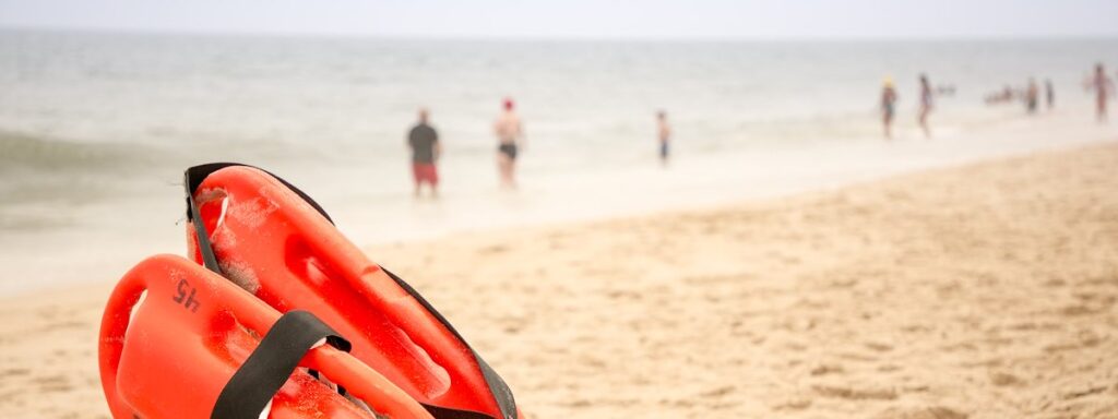 a life jacket and life vest on a beach