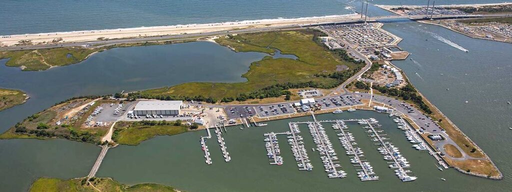 an aerial view of a marina with boats in the water