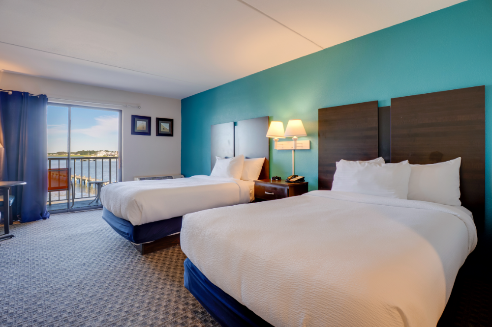 two double beds in a hotel room