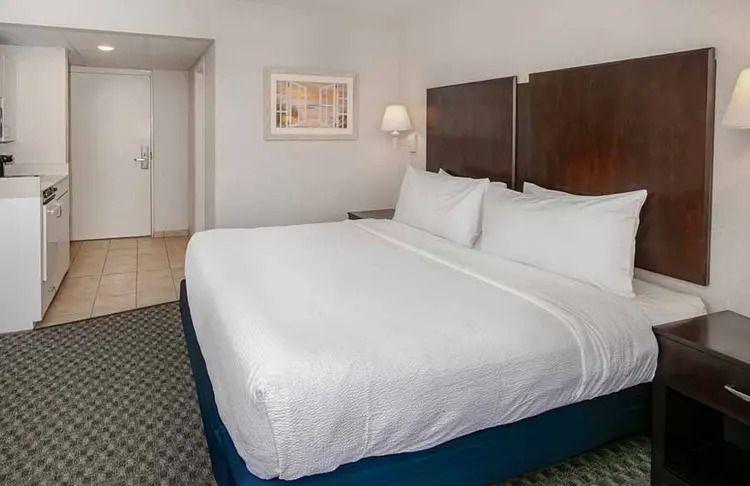 King size bed in a hotel room.