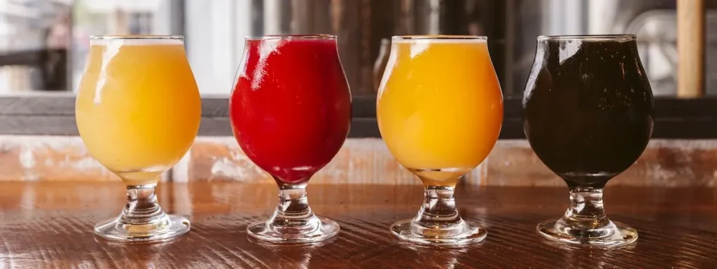 4 beverages on a bar top