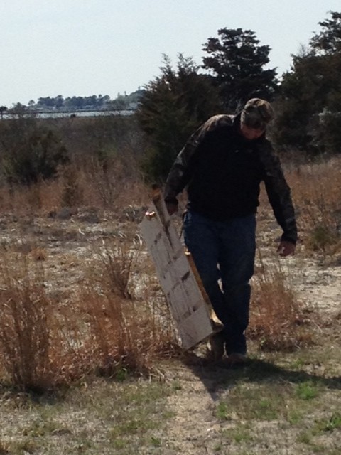 Cory dragging a door