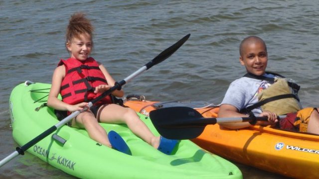 family kayaking