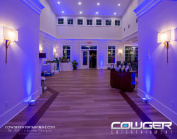 colorful wall and mood lighting for wedding reception entrance foyer