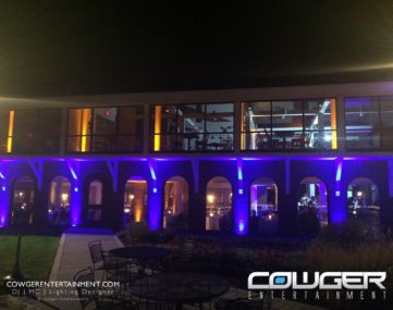 outside of reception hall with colorful exterior lighting
