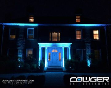 lit up colums, portico, and walls of front exterior