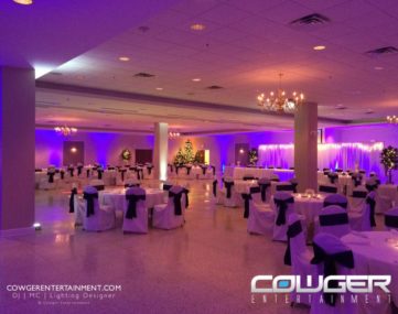 wide view colorfully lit wedding reception