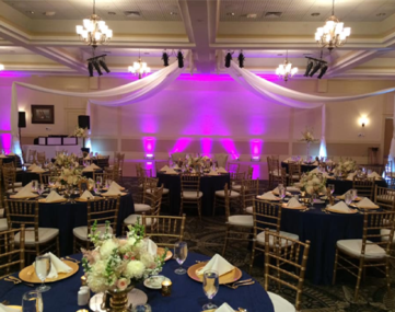 well lit reception area with colorful lit walls